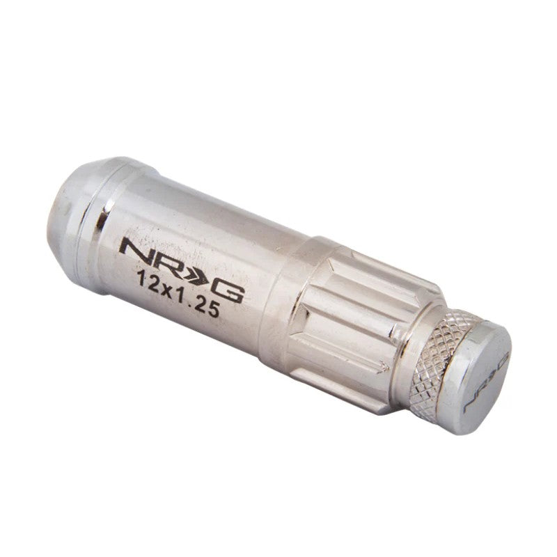 Silver NRG 700 Series M12 x 1.25 steel lug nuts with protective dust caps and security lock socket