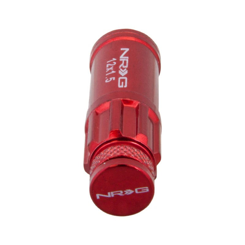 Red NRG 700 Series M12 x 1.5 steel lug nuts with integrated dust caps and security lock socket.