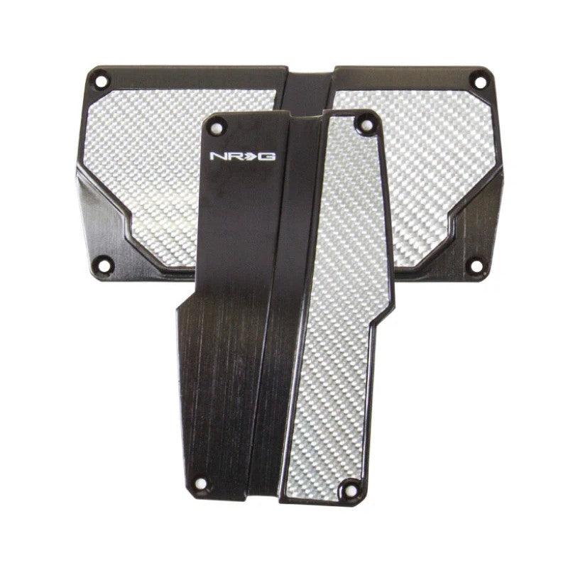 NRG black brushed aluminum automatic transmission pedal covers with silver carbon fiber inserts.
