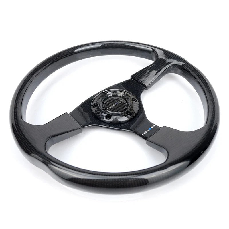 NRG 350mm carbon fiber steering wheel with three-spoke design and 6-bolt mounting pattern.