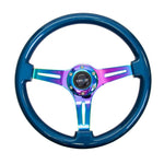 NRG 350mm steering wheel with Blue Pearl flake wood rim and Neochrome 3-spoke center.
