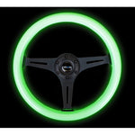 NRG Classic 350mm steering wheel with glow-in-the-dark green wood grain grip and black 3-spoke center.