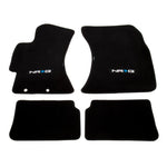 Four-piece black floor mat set with NRG logo for 2009-2011 Subaru Impreza WRX and STi.