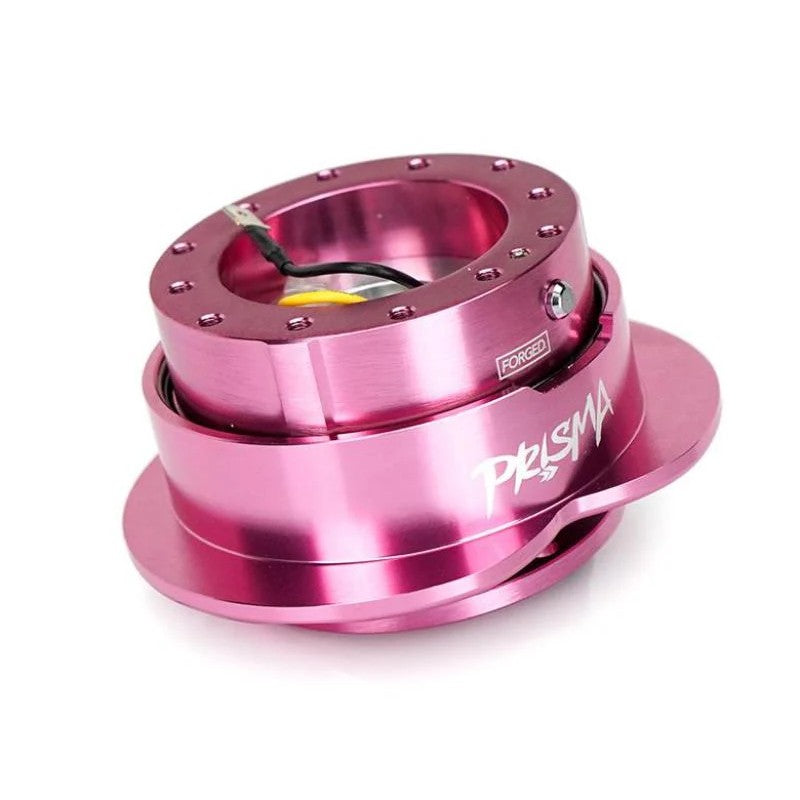 Pink NRG Gen 143 steering wheel quick release kit featuring a pink heart-shaped release ring and CNC aluminum body.