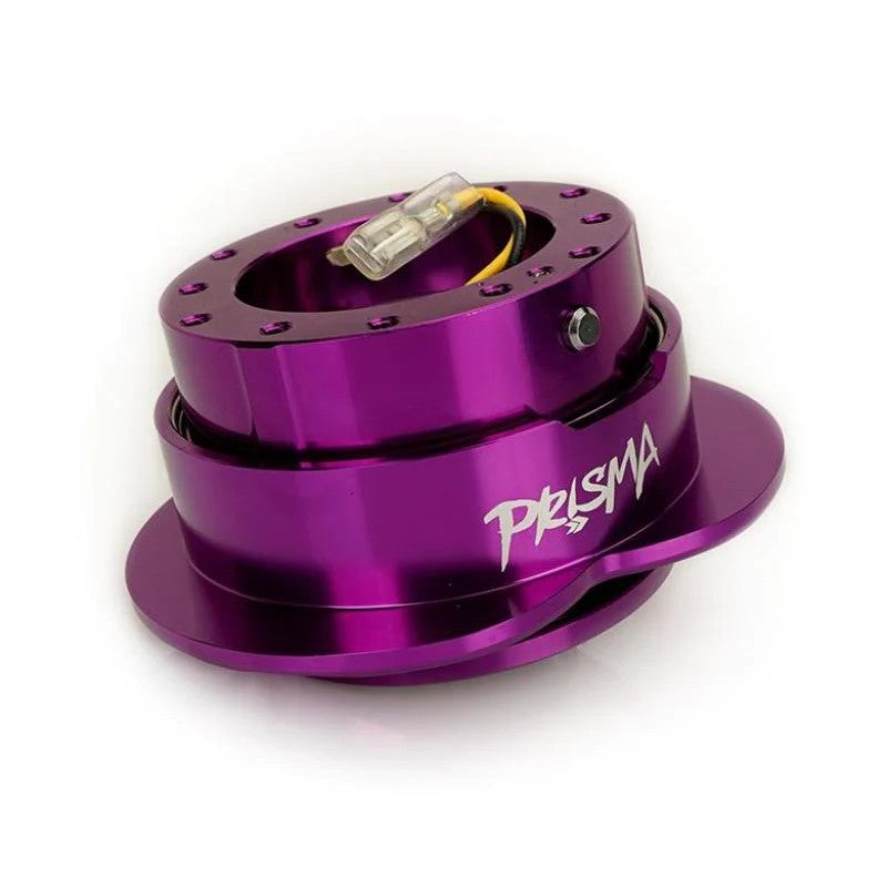 Purple anodized NRG Innovations Gen 143 Heart Quick Release steering wheel adapter with heart-shaped release ring.