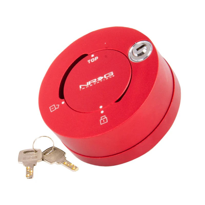 Red anodized NRG Innovations Quick Lock steering wheel security cap with keyhole for quick release hubs.
