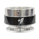 NRG Gen 1.5 steering wheel quick release adapter with black anodized aluminum body and a genuine carbon fiber ring.