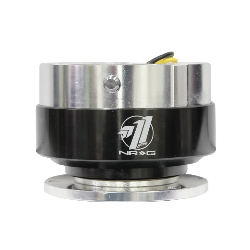 NRG Gen 1.5 quick release steering wheel adapter with silver aluminum body and black chrome ring