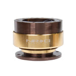 NRG Gen 2.0 steering wheel quick release featuring a bronze body and polished chrome gold ring.