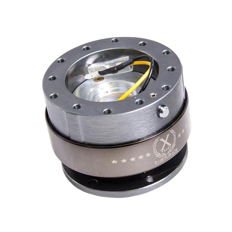 NRG Innovations Gen 2.0 steering wheel quick release adapter in gunmetal and titanium chrome.