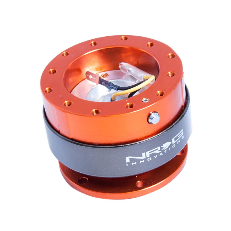 NRG Gen 2.0 steering wheel quick release featuring an anodized orange body and a titanium chrome ring.