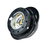 Black NRG Gen 2.2 steering wheel quick release adapter with a shiny black flared oval ring and ball-lock mechanism.
