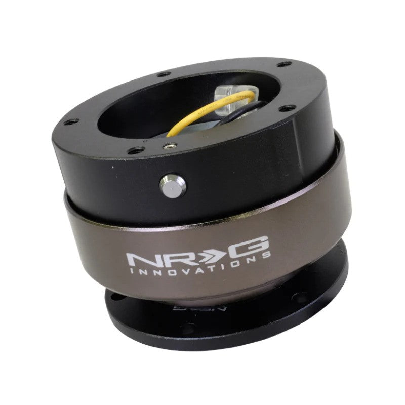 Black NRG Gen 2.5 steering wheel quick release adapter with 6-hole base, 5-hole top, and ergonomic flared ring wings.