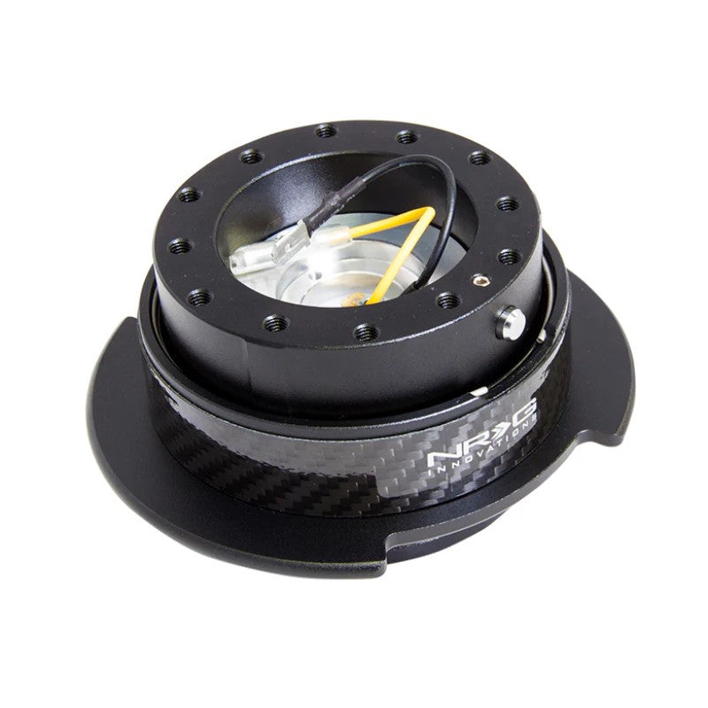 NRG Gen 2.5 steering wheel quick release kit featuring a black aluminum body and a flared carbon fiber ring.