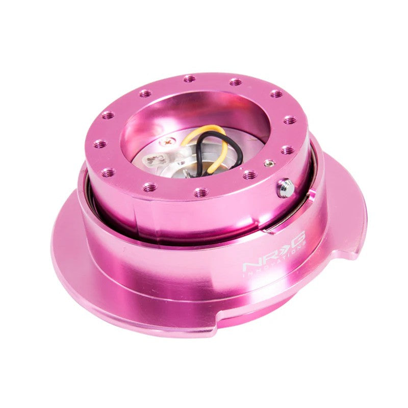 Pink anodized NRG Innovations Gen 2.5 steering wheel quick release with matching flared ring