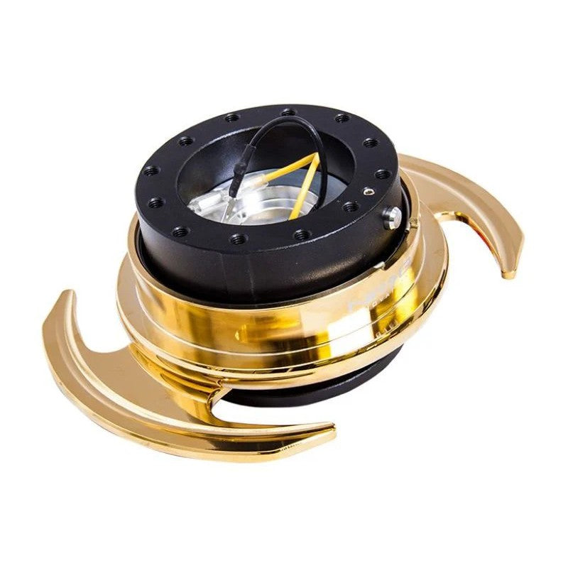 NRG Gen 3.0 steering wheel quick release hub with black body, chrome gold ring, and integrated finger handles.