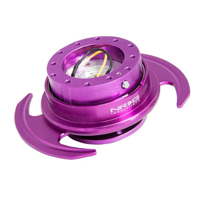 Purple NRG Gen 3.0 steering wheel quick release kit with purple ring and paddle-style handles.
