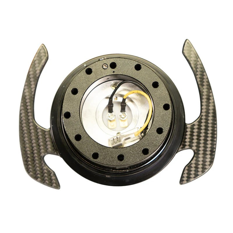 NRG Gen 4.0 steering wheel quick release in black with genuine carbon fiber handles