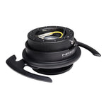 Black NRG Gen 4.0 steering wheel quick release kit with integrated removal handles and 6-bolt mounting pattern.