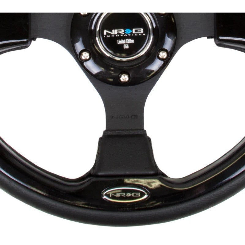 NRG RST-001BK 320mm black reinforced steering wheel with gloss black trim and 6-bolt mounting center.