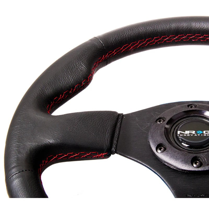 320mm NRG Reinforced steering wheel featuring black leather wrap with red contrast stitching.