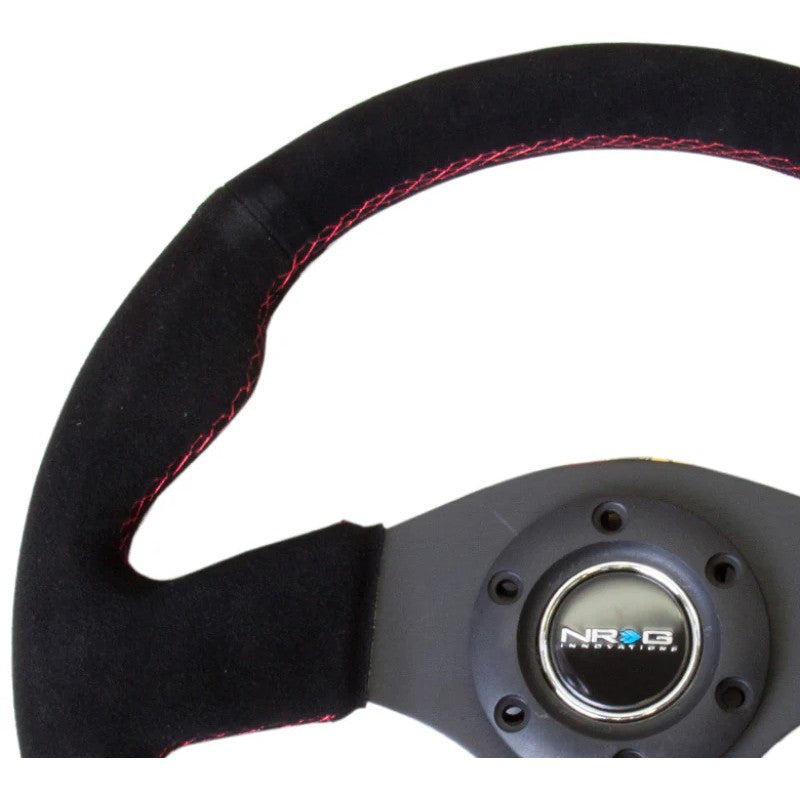 NRG Reinforced Series 320mm steering wheel featuring a black suede grip with red baseball stitching.