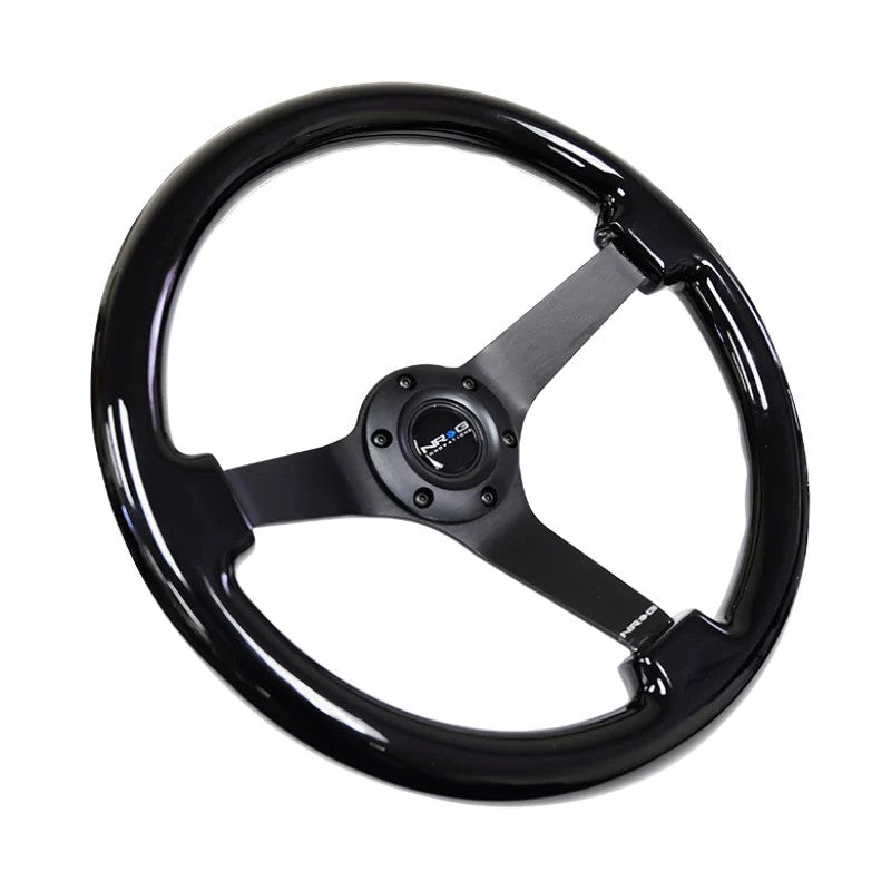 NRG 350mm reinforced steering wheel with 3-inch deep dish and black chrome solid 3-spoke center.