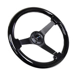 NRG 350mm reinforced steering wheel with 3-inch deep dish and black chrome solid 3-spoke center.
