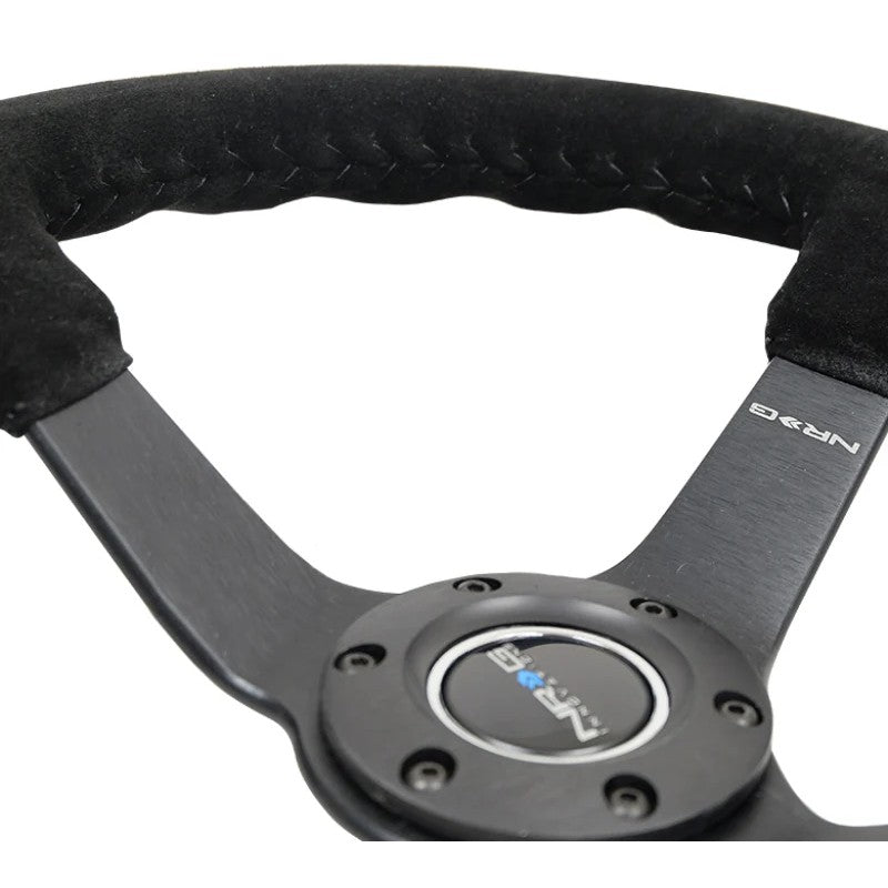 NRG 350mm deep dish steering wheel featuring black suede grip, black baseball stitching, and matte black 5mm spokes.