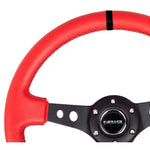 NRG reinforced 350mm steering wheel with red suede wrap and black three-spoke design featuring circle cutouts.