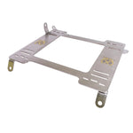 Pair of black powder-coated NRG SBK-SB01 steel seat brackets for 2002-2007 Subaru WRX and STI models.