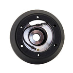 Matte black NRG Innovations SRK-106H short hub adapter showing the dual 6-bolt mounting pattern for Subaru applications.