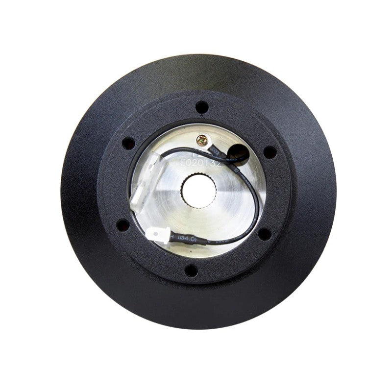 NRG Innovations SRK-121H black aluminum short steering wheel hub adapter for Toyota Supra and Celica.