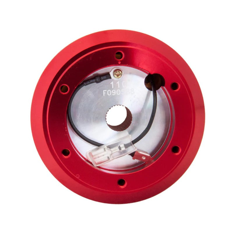 Red anodized NRG Short Hub Adapter SRK-110H-RD for Honda Civic and Acura Integra steering columns.