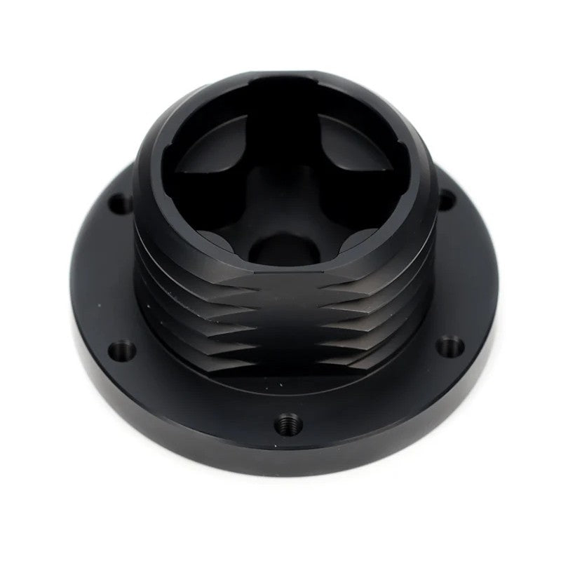 Black NRG SRK-TMH-BK short hub adapter for Thrustmaster sim racing wheel bases showing the 6-bolt mounting pattern.