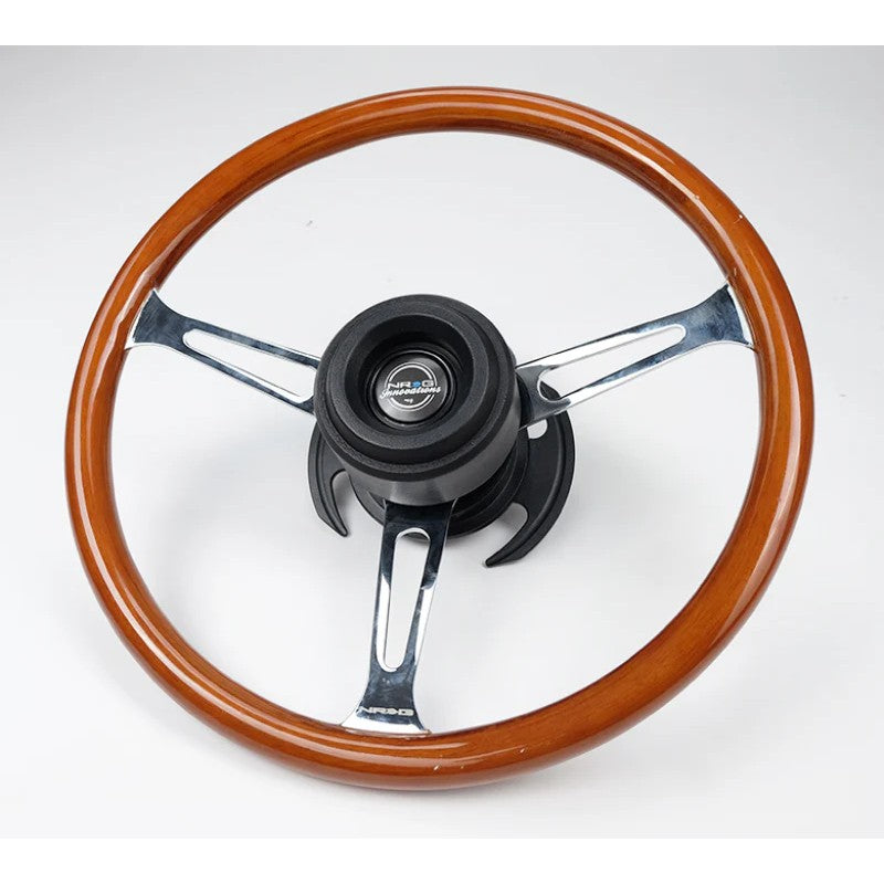Black injection-molded NRG Head Banger steering wheel impact protection pad