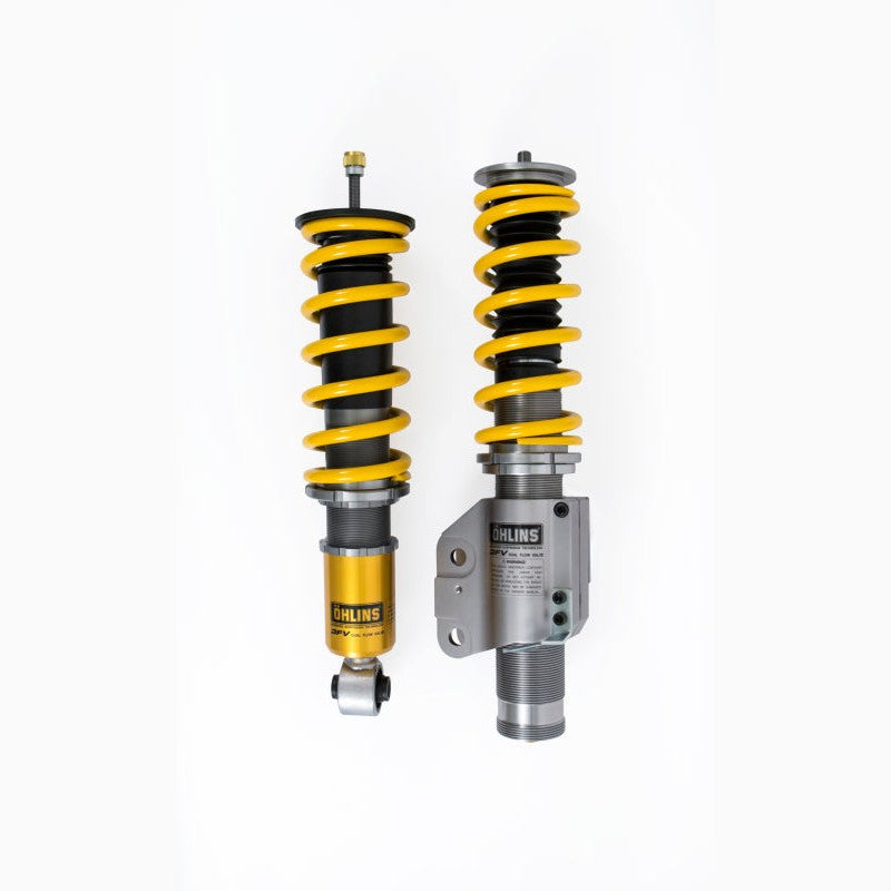 Öhlins Road & Track coilover kit with gold aluminum bodies, silver inverted struts, and black coil springs.