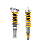 Set of Ohlins Road & Track coilovers featuring gold dampers, black springs, and silver hardware for Porsche 911 996.