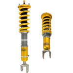 Ohlins Road & Track coilover kit for Honda S2000 featuring gold aluminum bodies and yellow coil springs