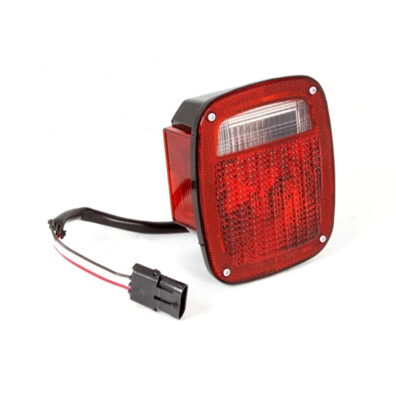 Omix driver side tail light assembly with black housing for 1987-1990 Jeep Wrangler