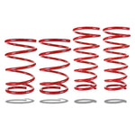 Red powder-coated Pedders SportsRyder coil lowering springs for 2003-2008 Subaru Forester SG.