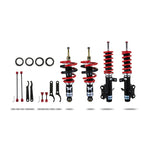 Pedders Extreme Xa monotube coilover kit with red springs and black shock bodies for 2010-2015 Chevrolet Camaro