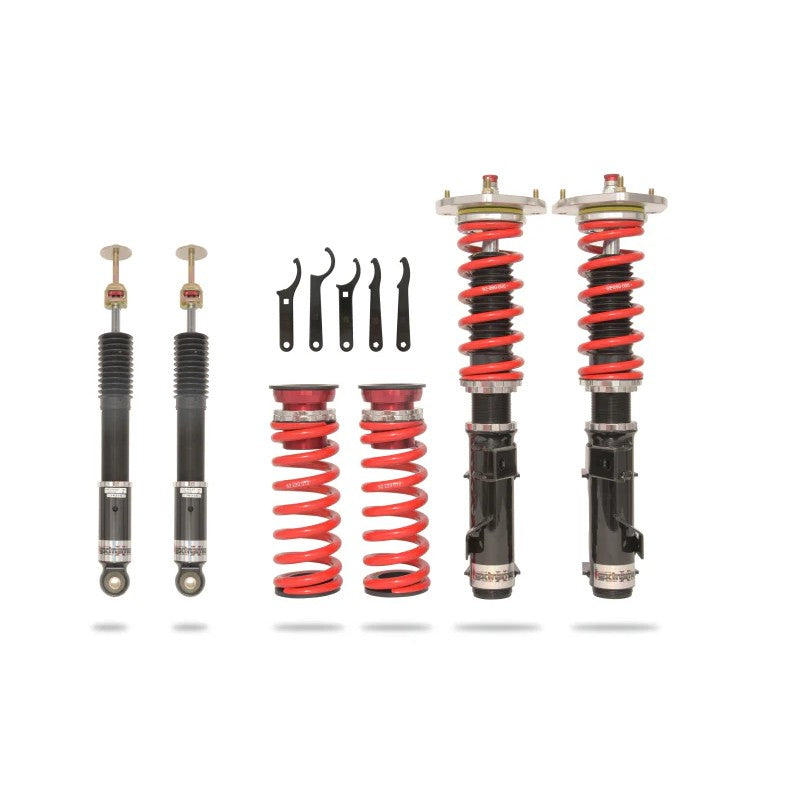 Pedders Extreme Xa monotube coilover kit with red springs and black shock bodies for 6th Gen Chevrolet Camaro