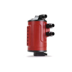 Red PERRIN Air Oil Separator canister with mounting bracket and hose fittings for Subaru WRX and STI.