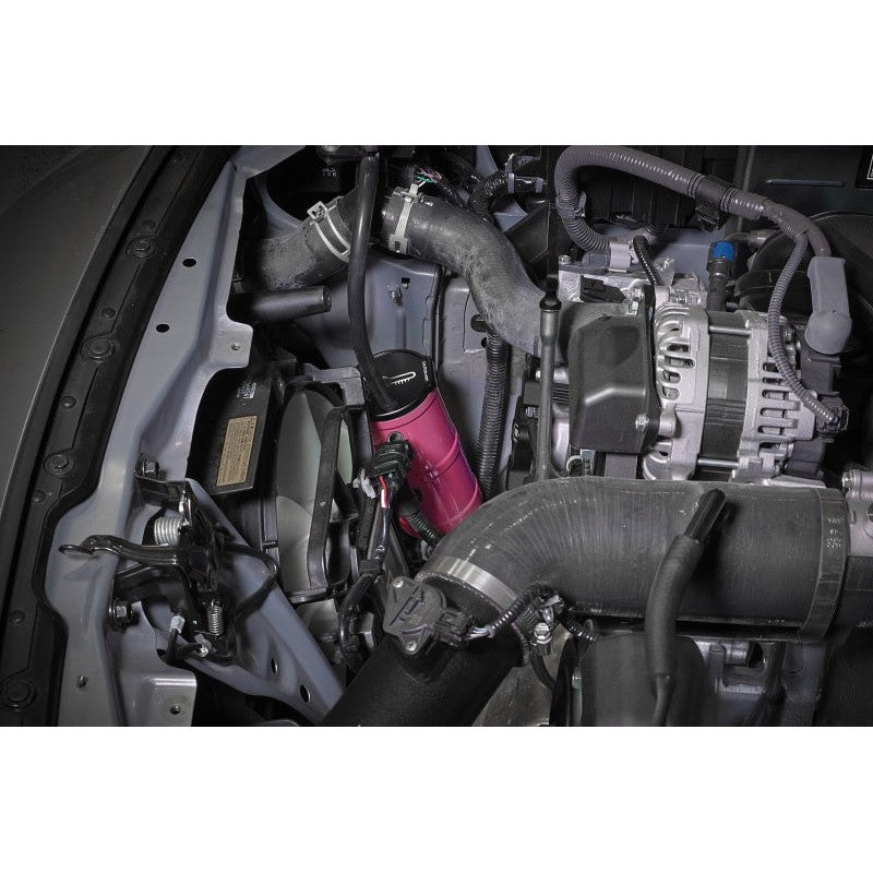CNC-machined aluminum PERRIN coolant overflow tank in Hyper Pink for Subaru WRX, STI, and BRZ