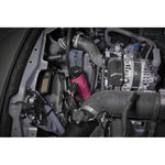 CNC-machined aluminum PERRIN coolant overflow tank in Hyper Pink for Subaru WRX, STI, and BRZ