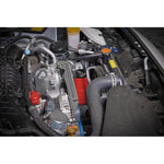 Red CNC-machined aluminum PERRIN coolant overflow tank for Subaru WRX, STI, and BRZ/GR86 models.