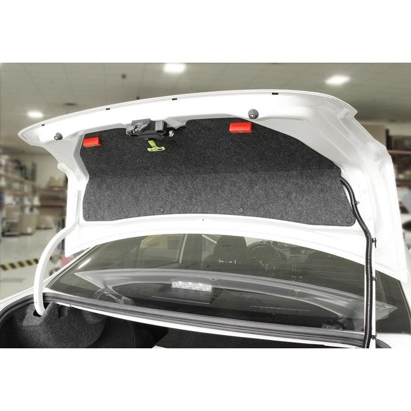 Red PERRIN interior trunk pull handle for 2015-2020 Subaru WRX and WRX STI sedans.