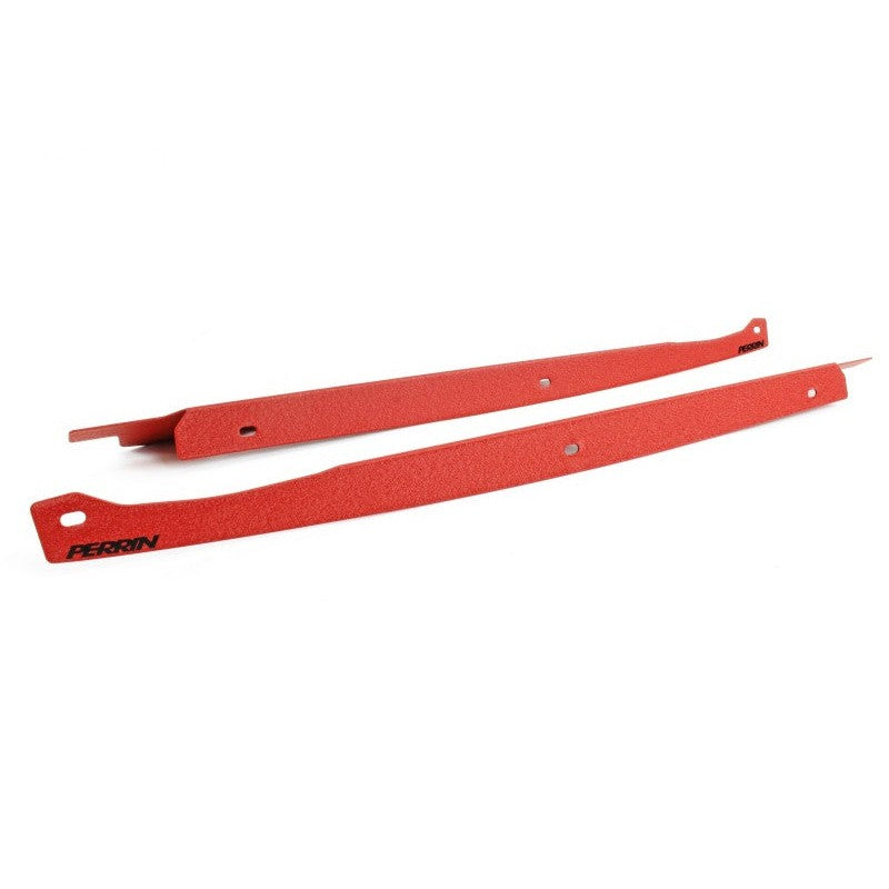 Set of two red powder-coated PERRIN fender shrouds for 2008-2014 Subaru WRX/STI and 2008-2011 Impreza.
