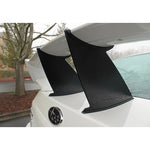 Black PERRIN wing stabilizer wedge installed between the trunk lid and rear spoiler on a 2011-2014 Subaru WRX STI sedan.